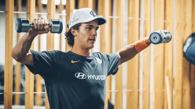 Ben Silvagni works out in the weights room at Carlton.