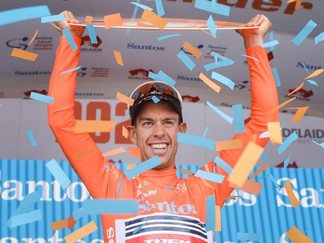 Australian rider Richie Porte from team Trek-Segafredo reacts on the podium after winning the Tour Down Under UCI World Tour cycling event in Adelaide on January 26, 2020. (Photo by Brenton EDWARDS / AFP) / -- IMAGE RESTRICTED TO EDITORIAL USE - STRICTLY NO COMMERCIAL USE --