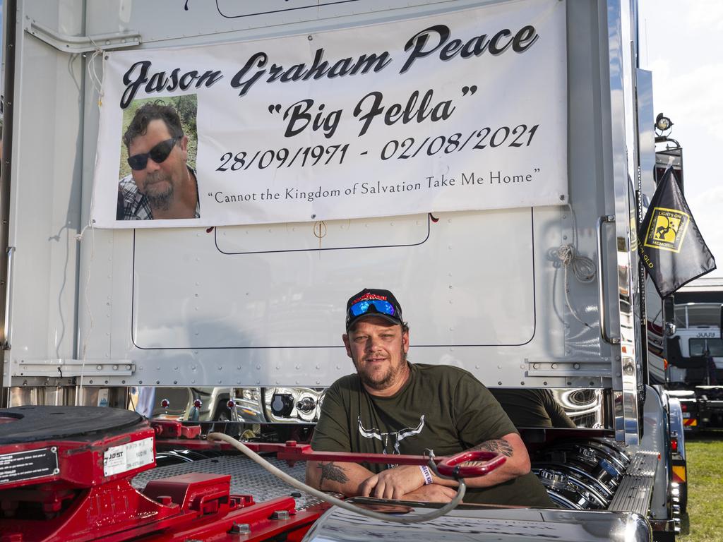 Shaun Butler stands by his memorial to Jason Peace at Lights on the Hill Trucking Memorial at Gatton Showgrounds, Saturday, October 5, 2024. Picture: Kevin Farmer