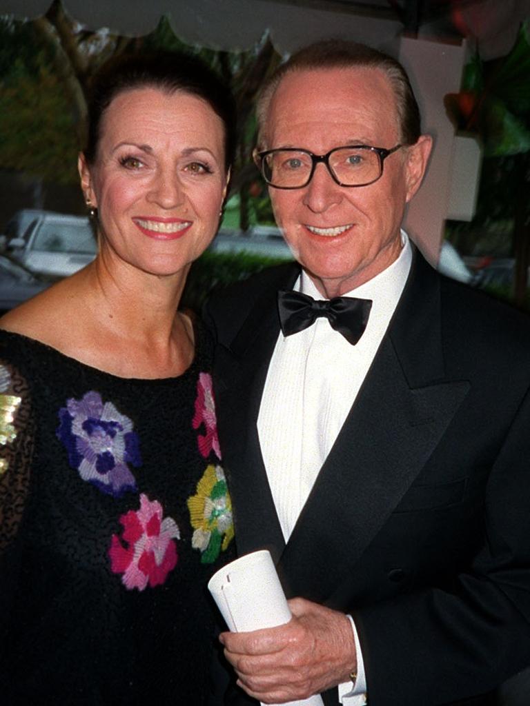 Henderson with wife Mardi at his farewell party in 2002.