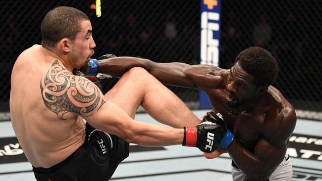 Whittaker earned a unanimous points victory over American Jared Cannonier.