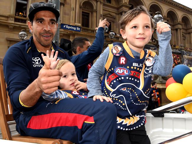 Eddie Betts with sons Billy and Lewis during the grand final parade. Picture: Nicole Garmston