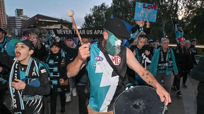 Port Adelaide Army cross the footbridge to the Port v Hawthorn semi final at Adelaide Oval. Picture: Brenton Edwards