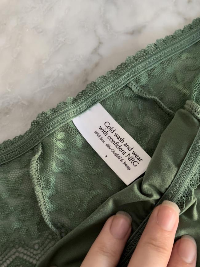 The labels feature minuscule sizing information because ‘it doesn’t matter what size it is’, the brand said. Picture: Supplied/news.com.au