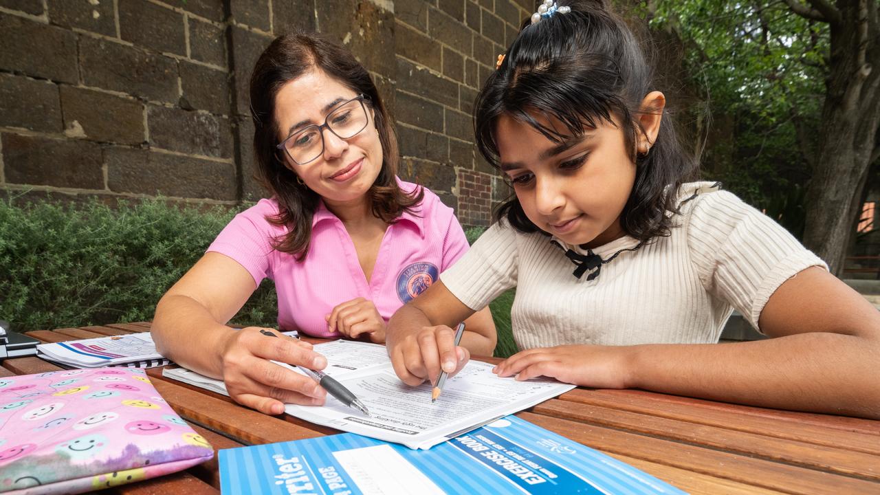 Grade five student Belicia Batra prepares for the first day of school with her tutor, Reema Verma. Picture: Tony Gough