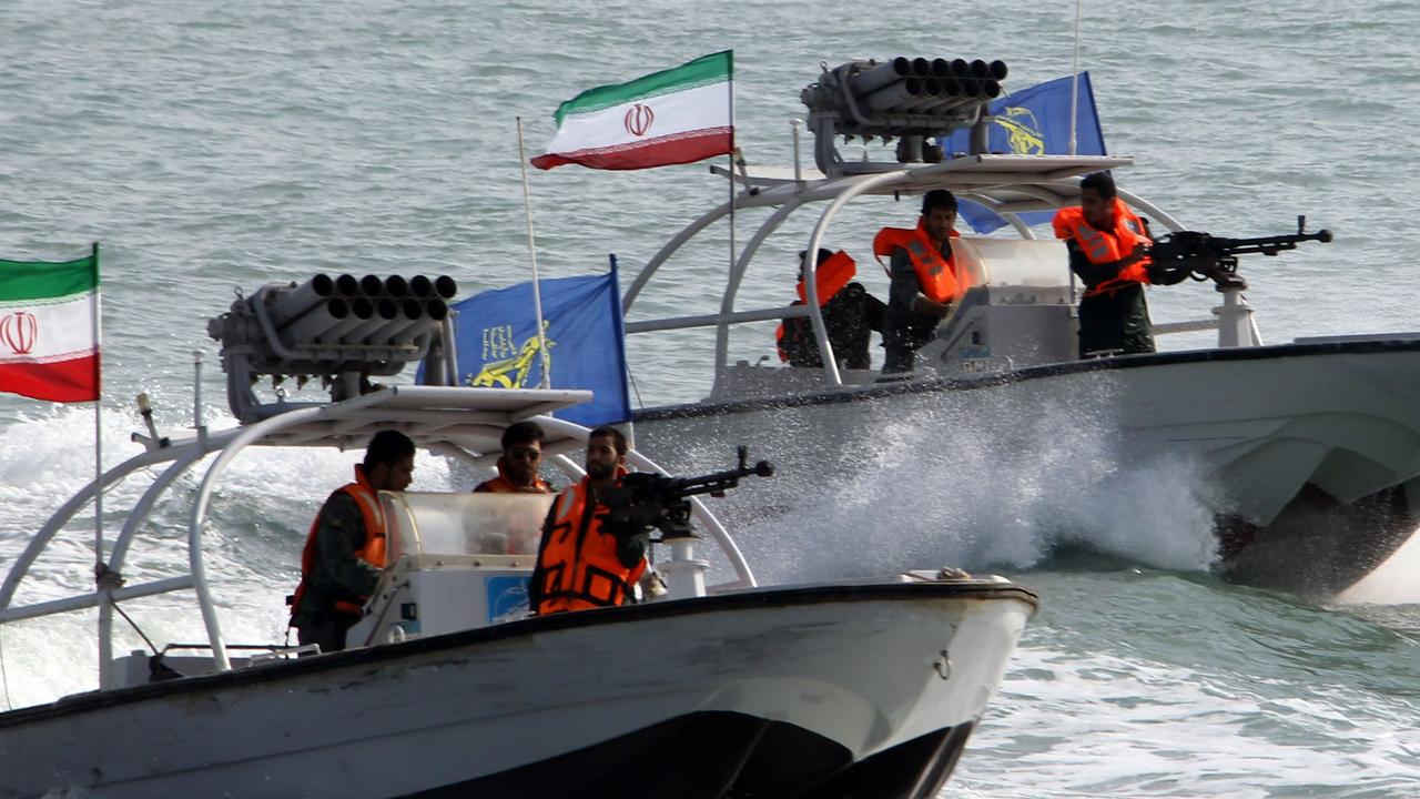Iranian Revolutionary Guards drive armed speedboats. Picture: AFP