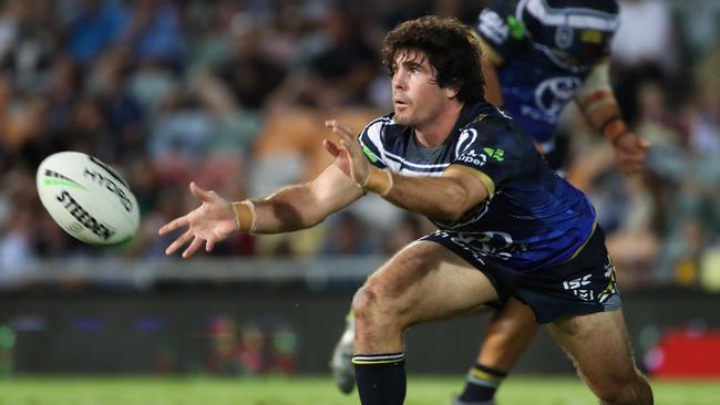 Jake Granville of the Cowboys gets a pass away during the Round 8 NRL match between the North Queensland Cowboys and the Gold Coast Titans at 1300SMILES Stadium in Townsville, Friday, May 3, 2019. (AAP Image/Michael Chambers) NO ARCHIVING, EDITORIAL USE ONLY
