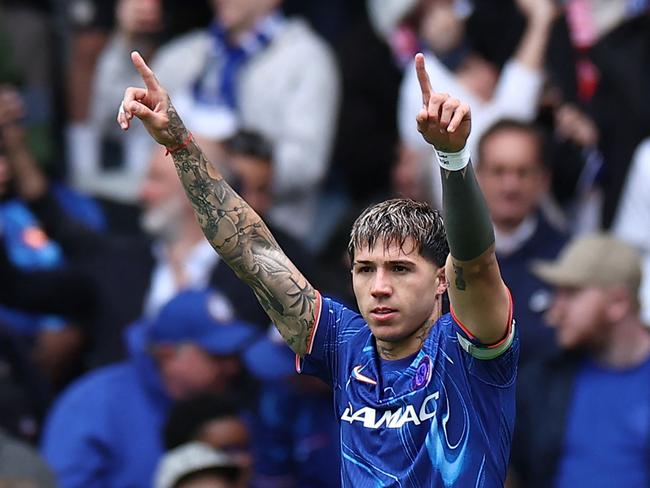 TOPSHOT - Chelsea's Argentinian midfielder #08 Enzo Fernandez celebrates scoring the opening goal during the English Premier League football match between Chelsea and Liverpool at Stamford Bridge in London on May 4, 2025. (Photo by HENRY NICHOLLS / AFP) / RESTRICTED TO EDITORIAL USE. No use with unauthorized audio, video, data, fixture lists, club/league logos or 'live' services. Online in-match use limited to 120 images. An additional 40 images may be used in extra time. No video emulation. Social media in-match use limited to 120 images. An additional 40 images may be used in extra time. No use in betting publications, games or single club/league/player publications. /