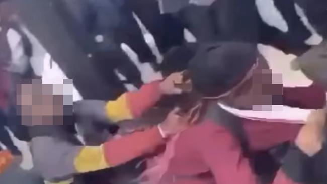 A schoolgirl has her hair pulled in a sickening video posted online. Picture: Instagram