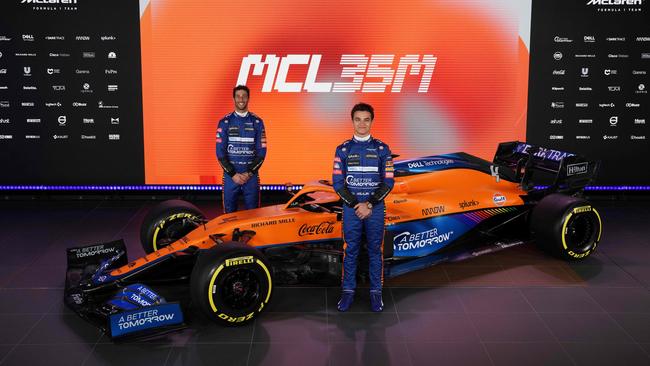 McLaren drivers Daniel Ricciardo and Lando Norris posing by the team’s new Formula 1 car, the MCL35M, in Woking, southwest of London. Picture: Handout/McLaren/AFP