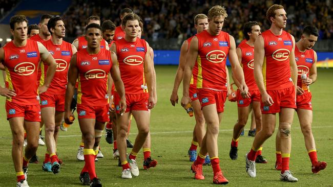 Gold Coast players after losing to West Coast in Perth.