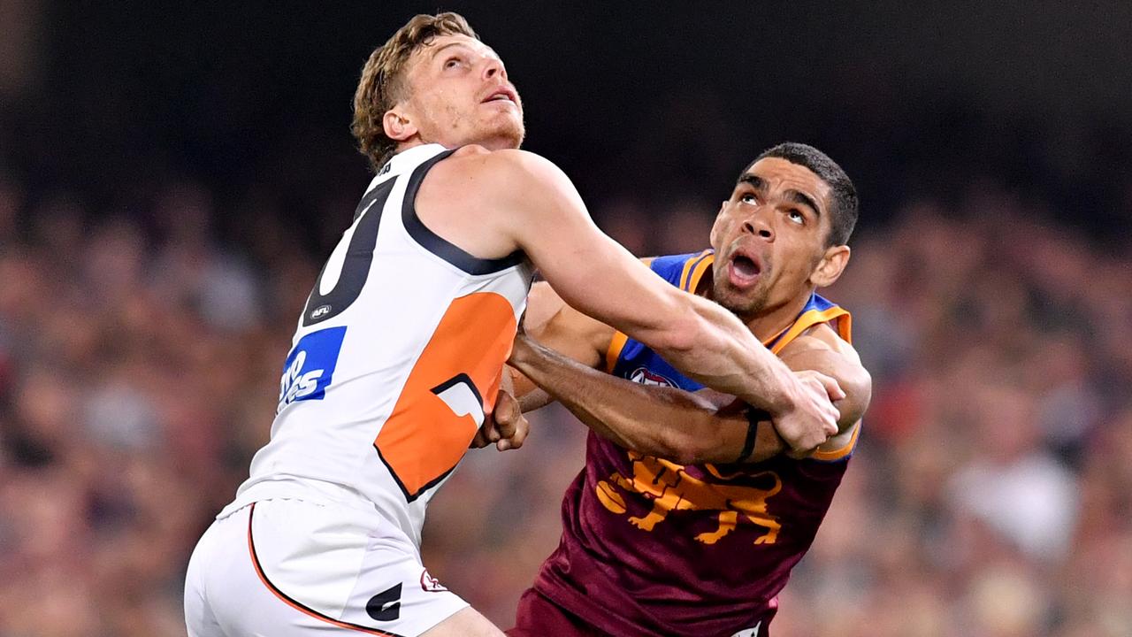 Adam Kennedy battled with Charlie Cameron during Saturday night’s semi final. (AAP Image/Darren England