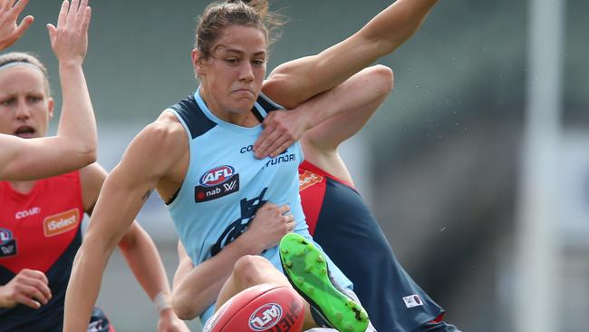 Carlton’s Katherine Gillespi-Jones receives a hard tackle. Picture: David Crosling