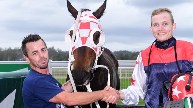 Former jockey Jackson Morris trained his first winner at Ipswich with Justin Huxtable in the saddle. Picture: Grant Peters/Trackside Photography