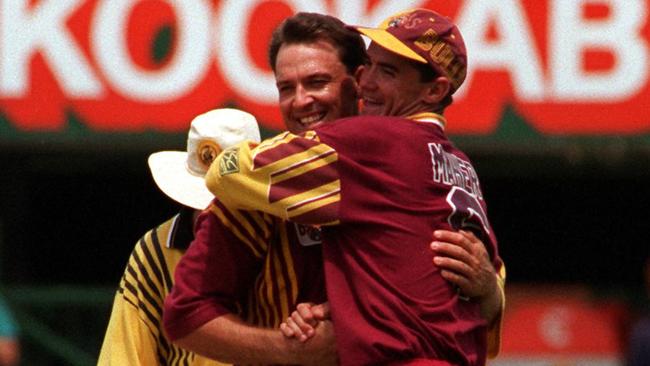 Scott Prestwidge is hugged by Jim Maher. He was a valued member of Queensland one-day teams.