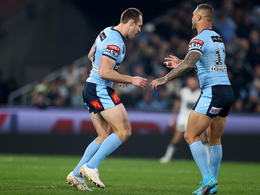 Yeo staggers away after the attempted tackle. Picture: Mark Kolbe/Getty Images