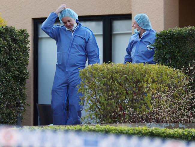 Police at the stabbing scene. Picture: Liam Kidston