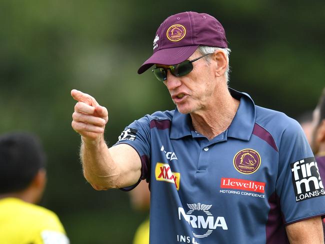 Jack Bird (left) is seen talking to Brisbane Coach Wayne Bennett (right) during Brisbane Broncos training at Clive Berghofer Field in Brisbane, Thursday, March 22, 2018. The Broncos are playing their third round NRL match against Wets Tigers on Friday night in Sydney. (AAP Image/Darren England) NO ARCHIVING, EDITORIAL USE ONLY