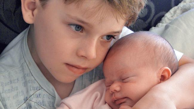 James McCaffery, then six, with his baby sister Dana. (Picture: Toni McCaffery) 