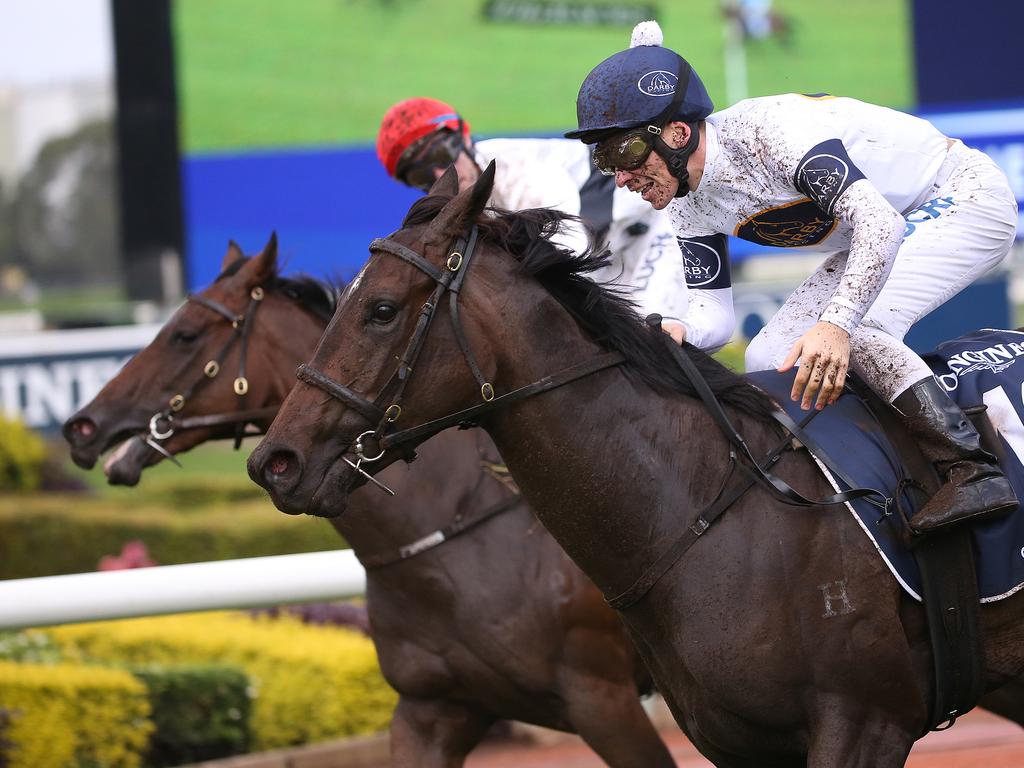 Jockey Ben Melham on She Will Reign wins the Longines Golden Slipper race.