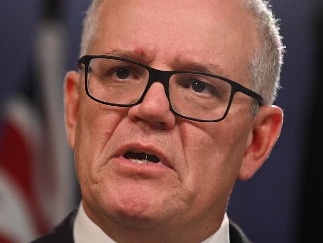 Australia's former prime minister Scott Morrison speaks to media during a press conference in Sydney on August 17, 2022. - Australia's Prime Minister Anthony Albanese on August 16 said that his predecessor Scott Morrison secretly seized control of five ministerial posts, labelling it an "unprecedented trashing of our democracy". (Photo by Steven Saphore / AFP)