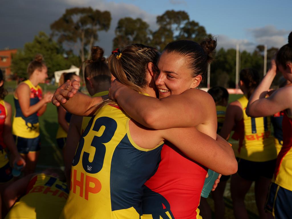 Ebony Marinoff hugs Anne Hatchard after their side’s win over Collingwood. Picture: Daniel Pockett/Getty Images.