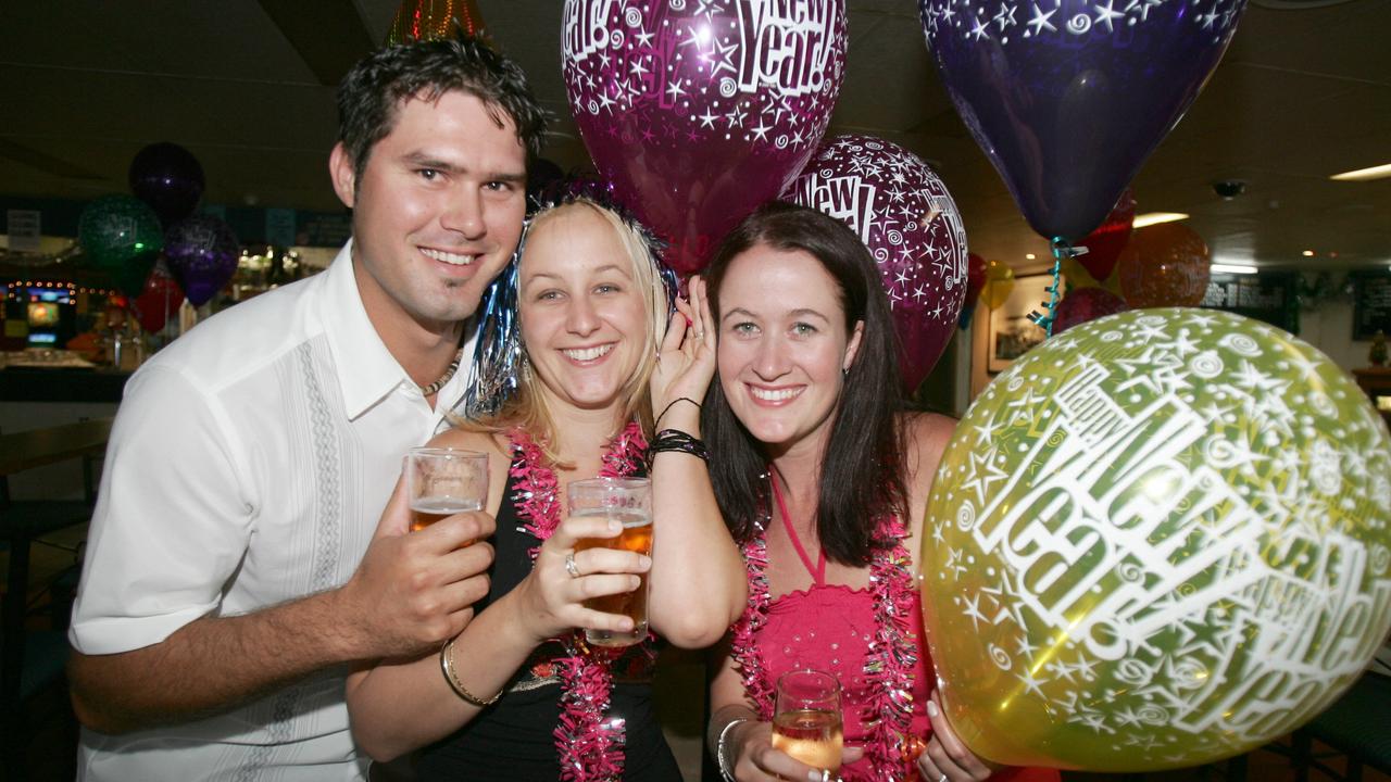 New Year’s Eve 2004 celebrations. Rick Wallace of Brisbane, Keely Mohr of Brisbane and Rebecca Hasson of Sydney. Picture: Richard Webb