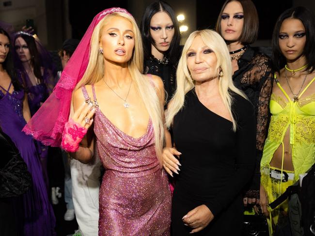 Fans have praised Paris for upholding her work commitments amid her personal struggle, pictured with Donatella Versace after the show. Picture: Backgrid