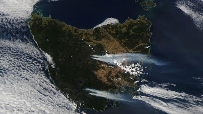 This satellite image shows Tasmanian bushfires burning across the state’s south and central districts. Picture: SUPPLIED