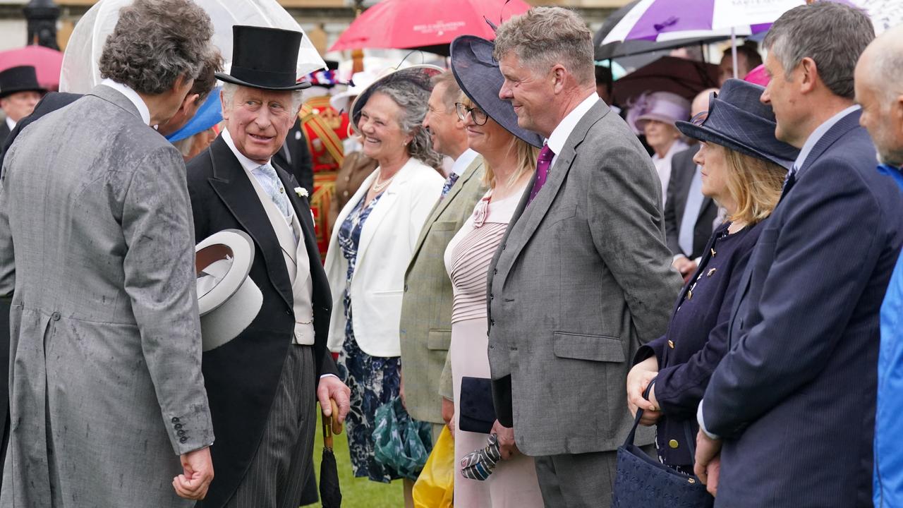 Prince Charles, Prince of Wales greets guests during a Royal Garden Party at Buckingham Palace on May 11, 2022 in London, England. Picture: Jonathan Brady – WPA Pool/Getty Images.