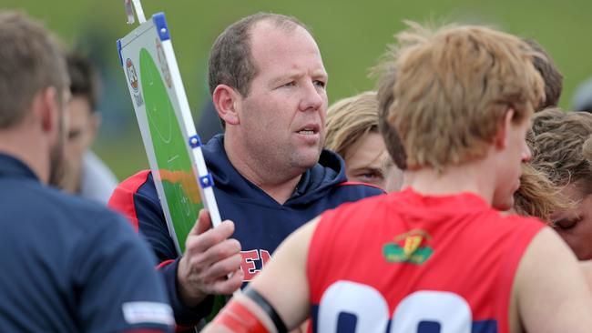 North Hobart coach Richard Robinson talks to his players. Picture: PATRICK GEE