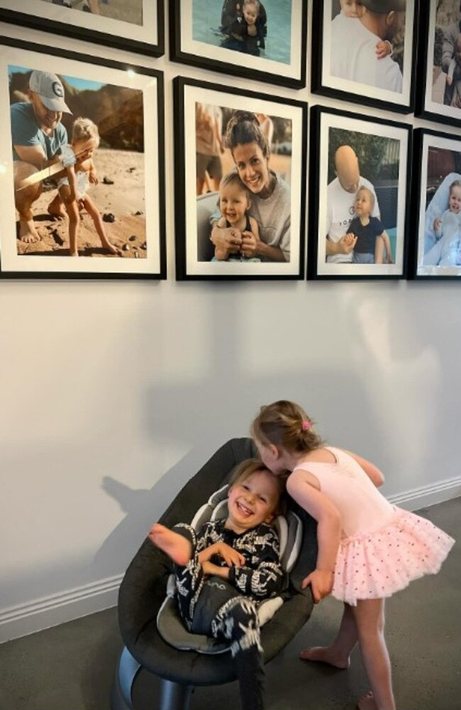 The image shows her two-year-old daughter Grace kissing her eldest son Levi, 5, on the head. Picture: Instagram