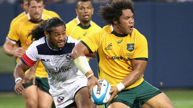 CHICAGO, IL - SEPTEMBER 05: Tatafu Polota-Nau #2 of the Australia Wallabies passes against the United States Eagles during a match at Soldier Field on September 5, 2015 in Chicago, Illinois. (Photo by Jonathan Daniel/Getty Images)