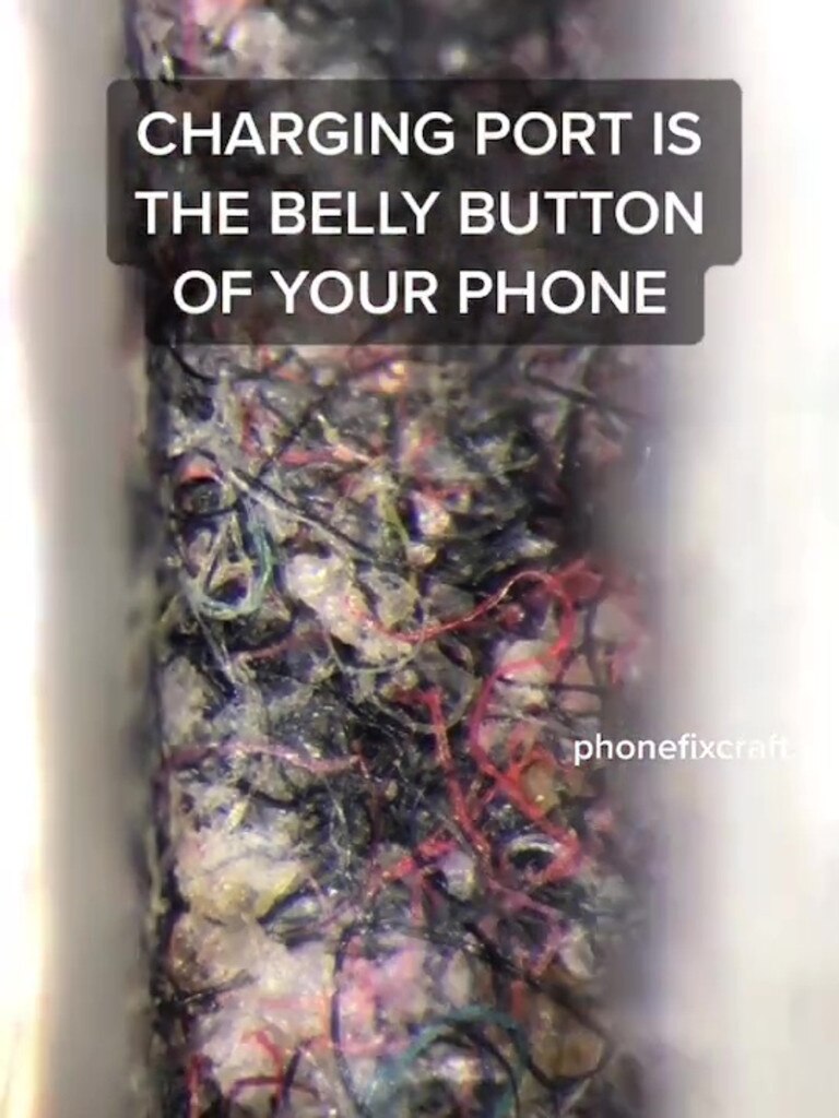 The charger port was full of clothes fibres, dead skin and dirt. Picture: phonefixcraft/TikTok