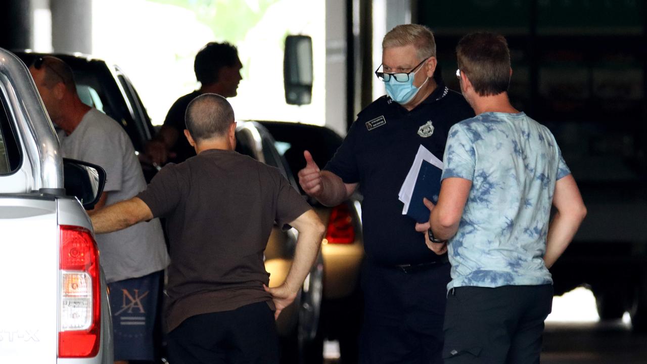 Police and members of the public at the Hotel Grand Chancellor in Brisbane on Thursday. Picture: David Clark