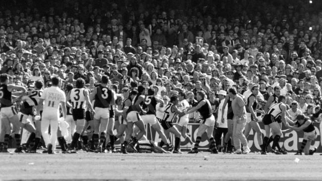 Sparks fly at quarter-time of the 1990 Grand Final.