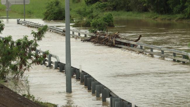 The Bohle River lower bridge has been closed due to flooding.