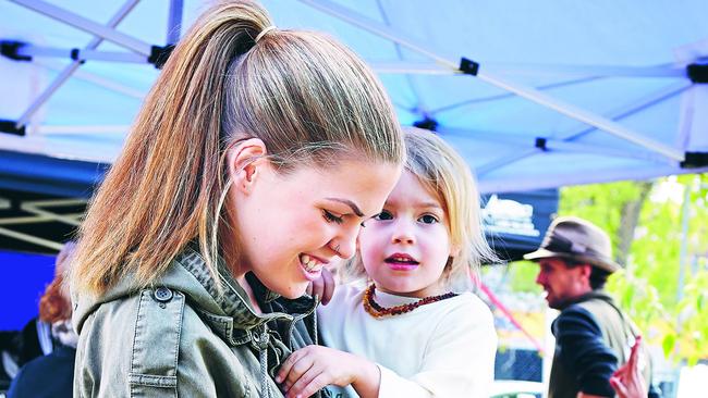 Belle Gibson with son Olivier in a photograph from her book <i>The Whole Pantry.</i>