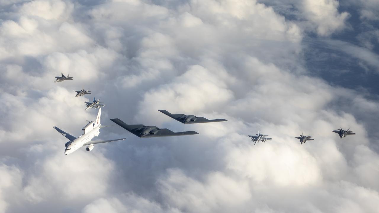 F-22 Raptor fighter jets flying along with other aircraft at the RAAF base in Amberley, Queensland. Picture: Australian Defence Force