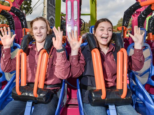 ADELAIDE, AUSTRALIA - SEPTEMBER 1, 2023: Loxton High School year 10 students Hunter Walmesley-Cotham and Javen Gum testing the Extreme Thriller ride at the Royal Show. Picture: Brenton Edwards