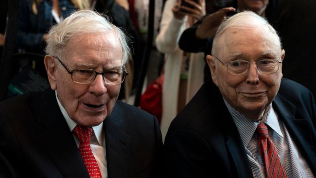 Warren Buffett (L), CEO of Berkshire Hathaway, and vice chairman Charlie Munger attend the 2019 annual shareholders meeting in Omaha, Nebraska, May 3, 2019. (Photo by Johannes EISELE / AFP)