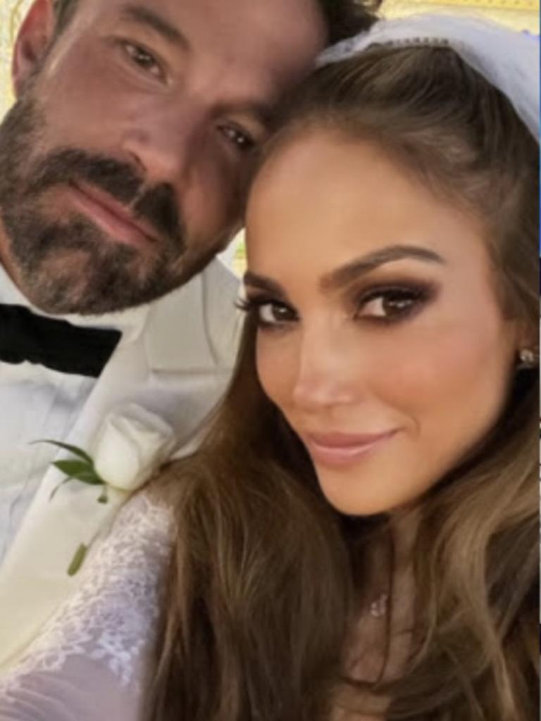 Lopez wore a white gown and a veil, while Affleck was in a matching suit and black bowtie.