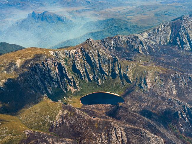 2019 Tasmanian bush fires. Lake Rhona and Denison Range, Gell River Fire - at Southwest National Park. . Picture - LUKE TSCHARKE / PAR AVION