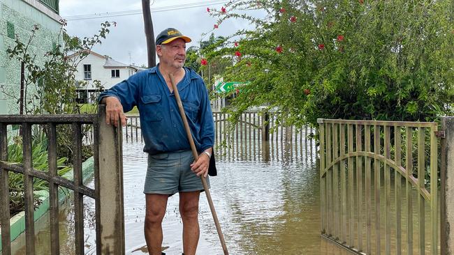 HOLD WEEKEND PAPERS - Guy with broom - Angelo Falconieri, 67, flooding at his home on Perkins St in Ingham - Photo Shayla Bulloch