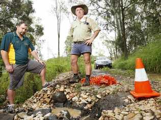 Laidley South and Mulgowie locals Barry Hotz and Simon Emmerson want to see this causeway on Sunset Boulevard fixed. Picture: David Nielsen