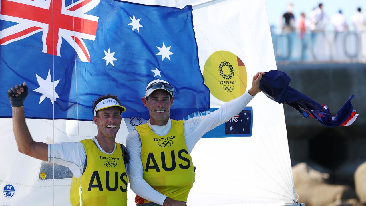 Mat Belcher and Will Ryan celebrate winning the last ever men’s 470 gold medal. Picture: Clive Mason/Getty