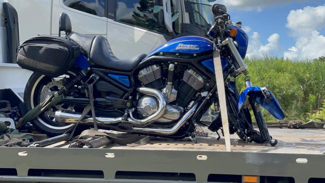 A motorcycle is loaded on to a tow truck at the scene of a two-vehicle crash on the Bruce Highway at Koumala on Easter Monday. The crash killed one man, left a woman in a critical condition and left five others injured. April 18, 2022. Picture: Janessa Ekert