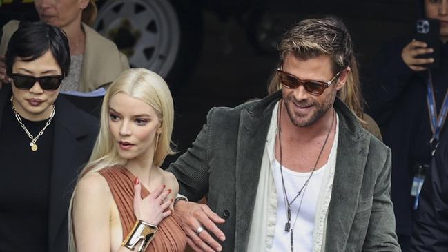 ONE TIME WEB USE FOR NEWS.COM.AU ONLY – FEES APPLY – ANYA TAYLOR-JOY AND CHRIS HEMSWORTH DODGE THE RAIN (AND PUDDLES) TO PROMOTE Ã¢â&#130;¬Å&#147;FURIOSA: A MAD MAX SAGAÃ¢â&#130;¬Â&#157;, WITH DIRECTOR GEORGE MILLER, AT CIRCULAR QUAY ON SYDNEY HARBOUR Picture: Media Mode