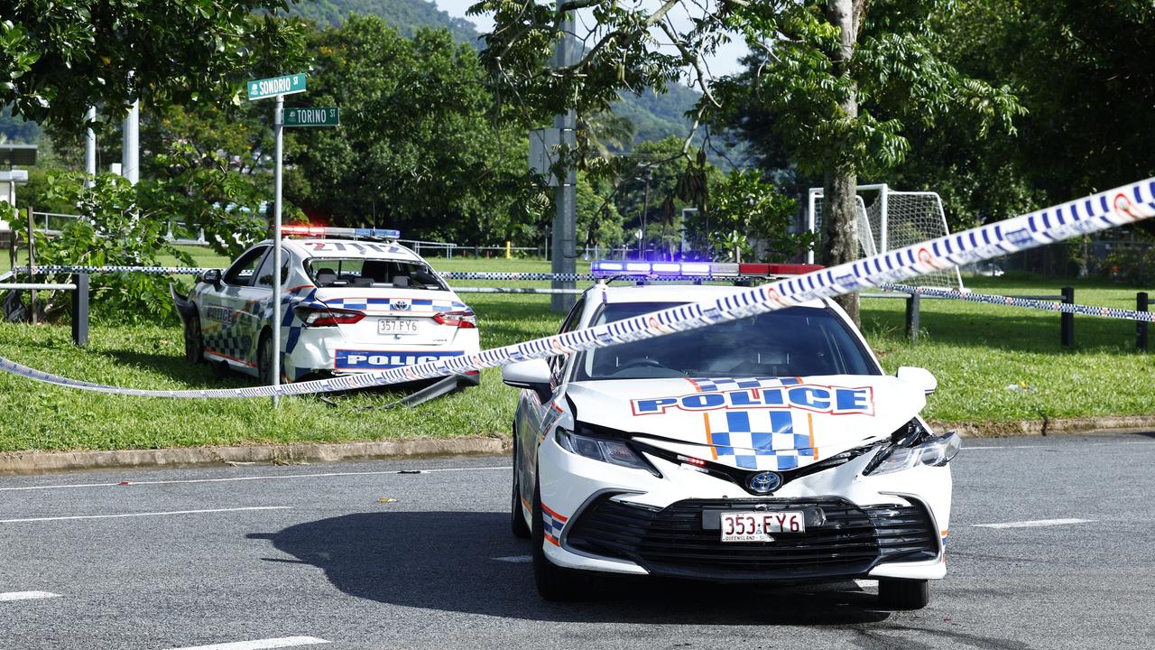 Police officers attend the scene of a car crash involving a stolen police. Picture: NCA NewsWire / Brendan Radke