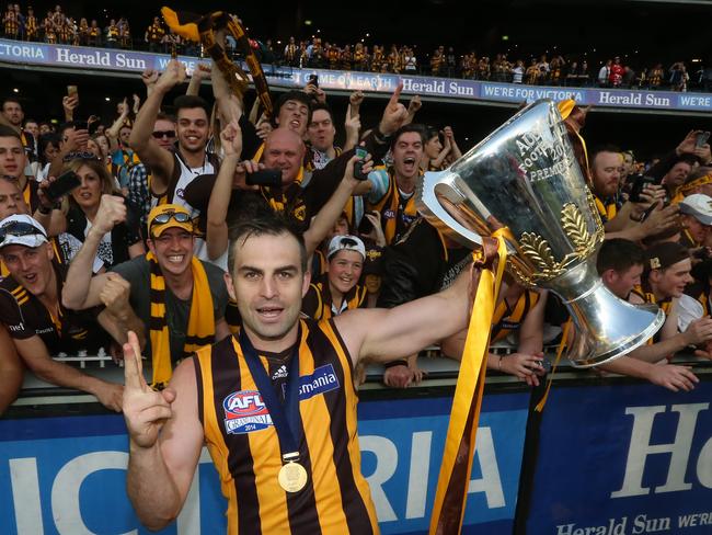 Brian Lake celebrates Hawthorn’s 2104 flag. Picture: Alex Coppel